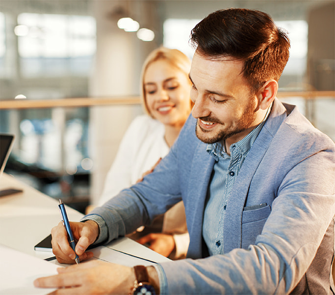 Two bankers in an office.